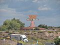 The remains of a pancake house peaks above the horizon in Houck, AZ