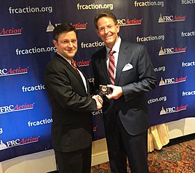 FRC President Tony Perkins presents the "True Blue" award to Congressman Mike Johnson