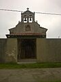 Fachada oeste campanario puerta principal