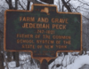 Photograph of a roadside historic marker along State Highway 80 in Burlington, Otsego County, New York.  Text on the marker reads FARM AND GRAVE JEDEDIAH PECK 1747 - 1821 FATHER OF THE COMMON SCHOOL SYSTEM OF THE STATE OF NEW YORK