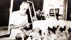 Photograph of Bhai Gian Singh Naqqash painting toys in his later years