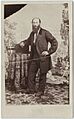 Photograph of Edward Kusel with a camera