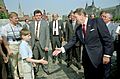 President Ronald Reagan greets a young boy while touring Red Square during the Moscow Summit in the USSR