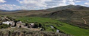 2013-06-16 15 39 56 View south across the Owyhee River as it flows past Mountain City in Nevada and Nevada State Route 225