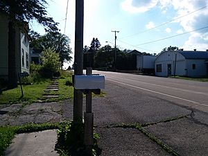 County Road O is the primary and sole modern-day  thoroughfare for the small hamlet.
