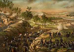 A painting depicting Union cavalry moving through a gap to attack Confederate infantry, with Union foot soldiers and cannons firing at the Confedereates on either side of the ridge