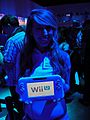 E3 2011 - Nintendo girl holding the Wii U controller (5831893934)
