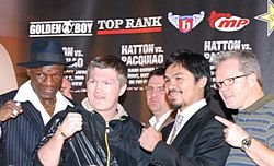 Hatton and Pacquiao with trainers
