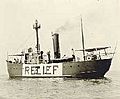 alt=A boat on the water, with RELIEF painted on the side in large letters