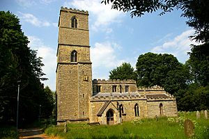 A large stone church seen from the south, showing a tall west tower, the clerestory, south aisle, porch and mausoleum