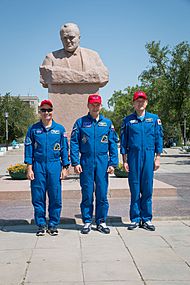 Soyuz MS-05 backup crew in front of the statue of Sergey Korolev