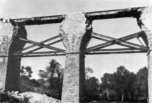 The Aix bridge, repaired with the carriage of a German railway gun