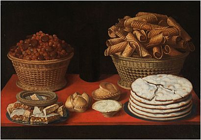 Tomás Yepes - Dulces y frutos secos sobre una mesa, 1600-35