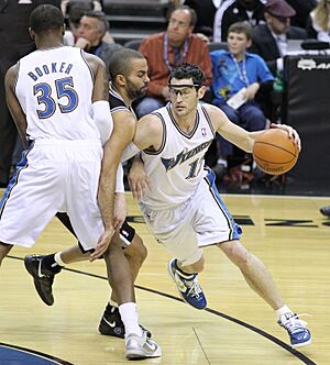 Trevor Booker, Tony Parker and Kirk Hinrich