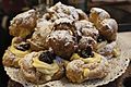 Zeppole stacked on a plate