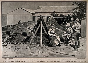 Boer War; three soldiers with a grand lady outside her bomb- Wellcome V0015621