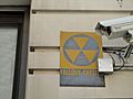 Fallout shelter sign on a building