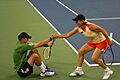 Martina give Bob Bryan a hand