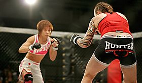 Megumi Fujii and Cody Welchlin square off in an MMA fight (DW)