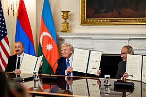P20250808DT-1377 President Donald Trump signs a trilateral joint declaration with President Ilham Aliyev of Azerbaijan and Prime Minister Nikol Pashinyan of Armenia
