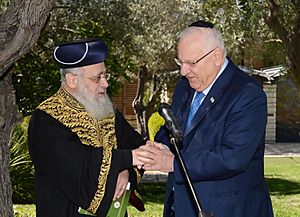 Reuven rivlin with the Rabbi Yitzchak Yosef, in the garden of the President's Residence to recite Birchat Ilanot (7676)