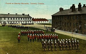 Postcard of Parade at Stanley Barracks, 1910.jpg