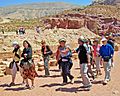 Tourists with guide in lower canyon, Petra
