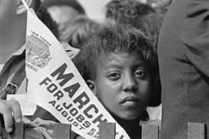 A Young Woman Holds a Banner at the Civil Rights March on Washington, D.C., on August 28, 1963
