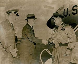 General Curtis LeMay greeted by Secretary of the Air Force James H. Douglas and Chairman of The Joint Chiefs of Staff General Nathan F. Twining at Washington National Airport