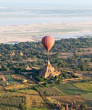 Hot air balloon over a pagoda in Bagan