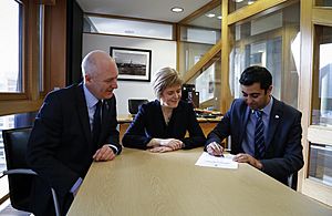 Humza Yousaf signing First Minister nomination form (15866448952)