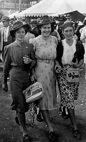 StateLibQld 1 72071 Three young women at the Townsville Show, 1941