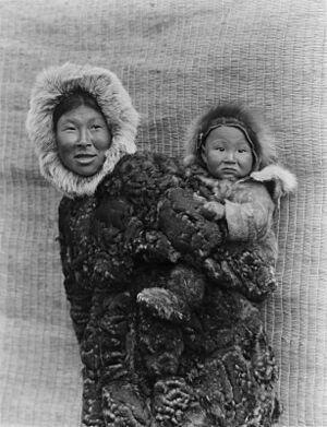 Woman and child - Nunivak - Edward S. Curtis - restoration1