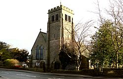Stone church with castellated tower