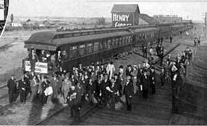 Businessmen at the Kennewick train station, September 1908 (WASTATE 1471)