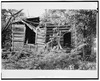 SOUTH FRONT ELEVATION SHOWING BOTH EXTERIOR AND INTERIOR LOG POSITIONS (copy negative, original 35 mm negative in field records) - Thomas Jefferson Walling Log Cabin, Henderson, HABS TEX,201-HEN,1-1.tif