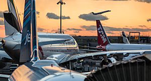 The sun sets over a crowded JFK (8444192213)