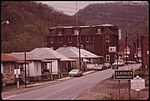 VIEW OF THE MAIN HIGHWAY WHICH RUNS THROUGH THE UNINCORPORATED TOWN OF CLOTHIER, WEST VIRGINIA, NEAR MADISON IN LOGAN... - NARA - 556420