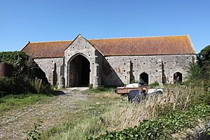 Woodspring Priory Barn circa 50 metres north west of priory church