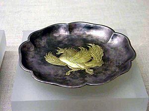 Gilt hexagonal silver plate with a feilian beast pattern