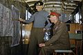 King George VI listens as Field Marshal Sir Bernard Montgomery outlines his future strategy at his mobile headquarters in Holland, 13 October 1944. TR2393