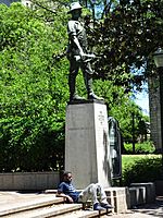 Man Rests by Statue - Birmingham - Alabama - USA (33575770054).jpg