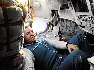 Oleg Skripochka inside Soyuz TMA 01M