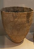 Pottery with notched strip on rim. Bronze Age.Daegu National Museum