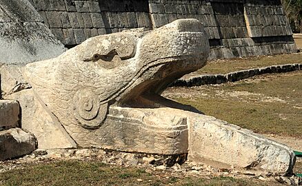 Serpent head at the base of El Castillo