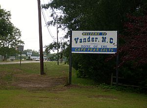 The welcome sign for Vander