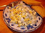05159 Salad with herring and corn. Sanok