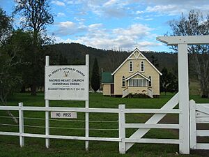 Church with sign and gate, Sacred Heart Catholic Church, Christmas Creek, 2005