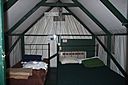 A photo showing the interior of a regular (single-wall design) tent cabin in Curry Village.