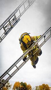 Firefighter ladder slide